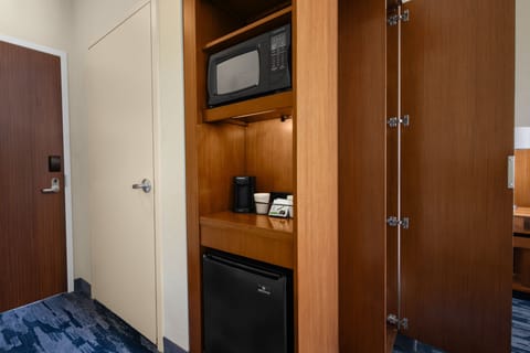 Premium bedding, desk, laptop workspace, iron/ironing board