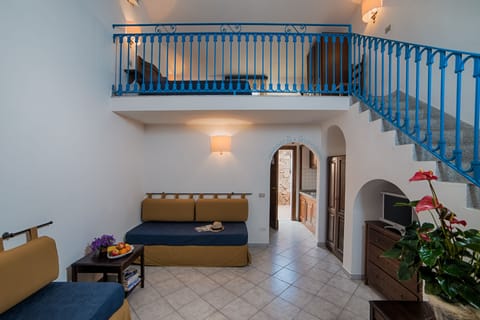 Family Room, Mezzanine | Minibar, in-room safe, free WiFi, bed sheets