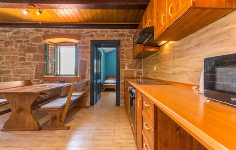 Apartment (A1) | Private kitchen | Fridge, microwave, stovetop, espresso maker