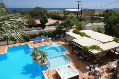 2 outdoor pools, pool umbrellas, sun loungers
