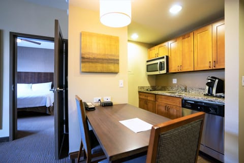 Suite, 1 King Bed | Private kitchen | Full-size fridge, microwave, oven, stovetop