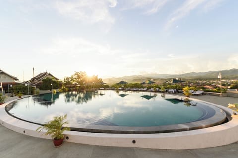 Outdoor pool, pool umbrellas, sun loungers