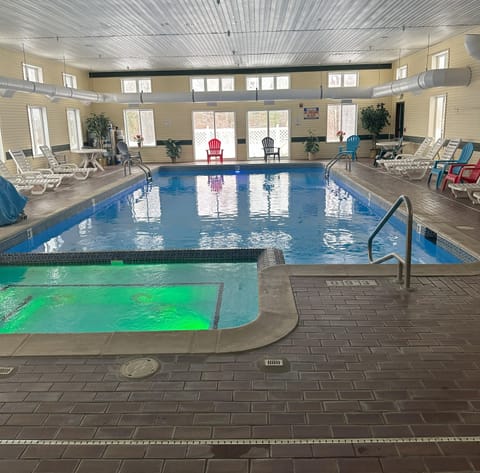 Indoor pool, open 9:00 AM to 9:00 PM, sun loungers