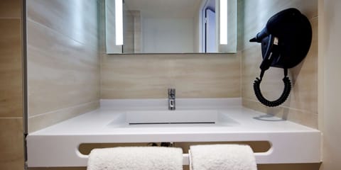 Shower, eco-friendly toiletries, hair dryer, soap