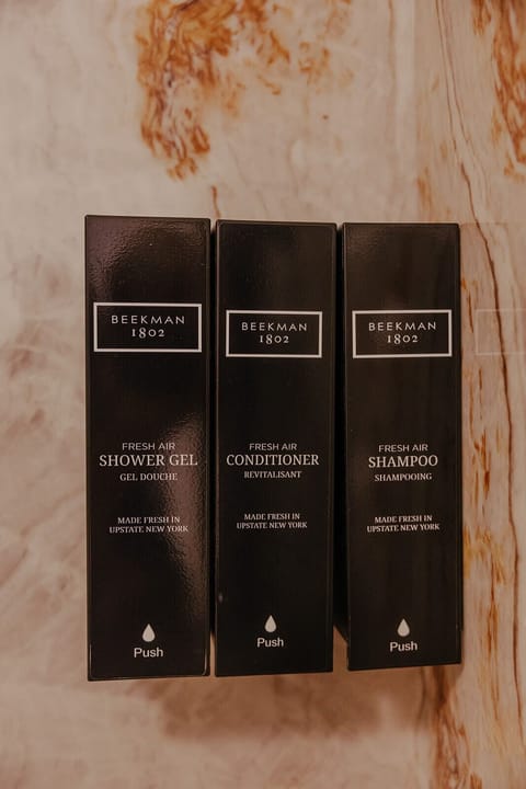 Eco-friendly toiletries, hair dryer, bathrobes, towels