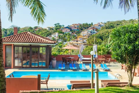 Outdoor pool, open 10 AM to 7 PM, sun loungers