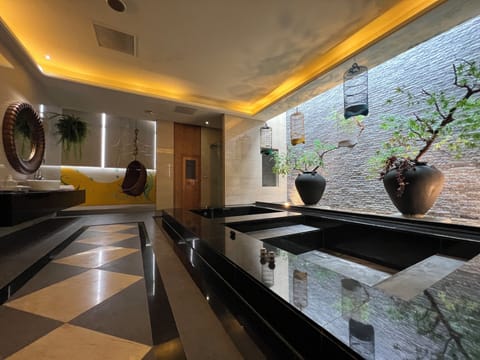Premium Quadruple Room (KTV) | Bathroom | Separate tub and shower, jetted tub, rainfall showerhead, hair dryer