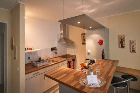 Comfort Suite | Private kitchen | Shared fridge, coffee/tea maker, highchair