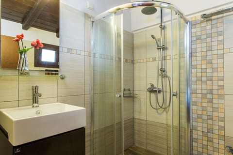 Shower, free toiletries, hair dryer, slippers