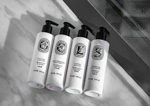 Hypo-allergenic bedding, down comforters, minibar, in-room safe