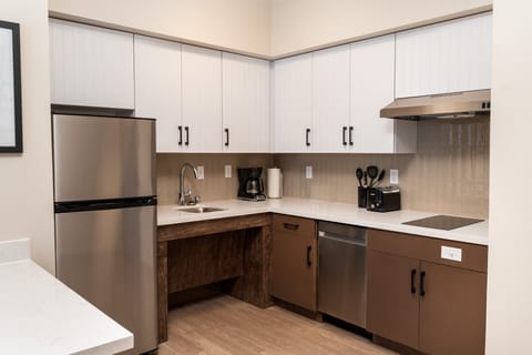 Desk, blackout drapes, iron/ironing board, free cribs/infant beds