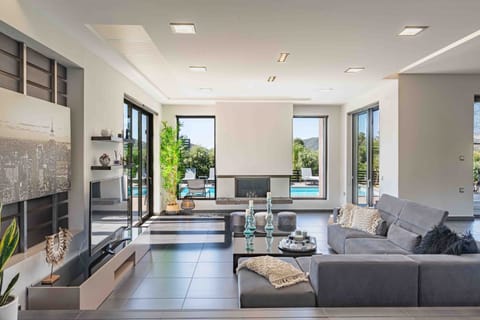 Luxury Villa, 6 Bedrooms, Private Pool, Mountain View | Living area | 60-inch flat-screen TV with satellite channels, TV, fireplace