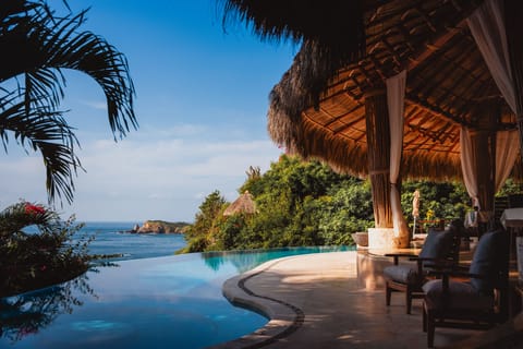 Outdoor pool, pool umbrellas, sun loungers