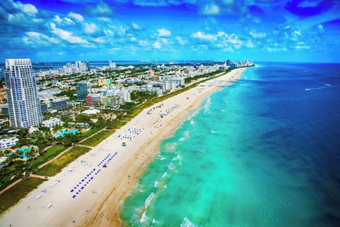 Beach nearby, white sand, sun loungers, beach umbrellas