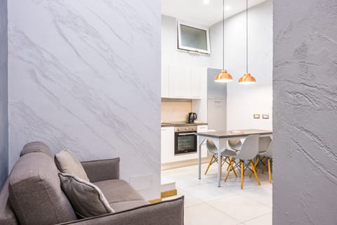 City Apartment | Living area | Flat-screen TV