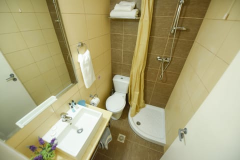 Shower, free toiletries, hair dryer, slippers