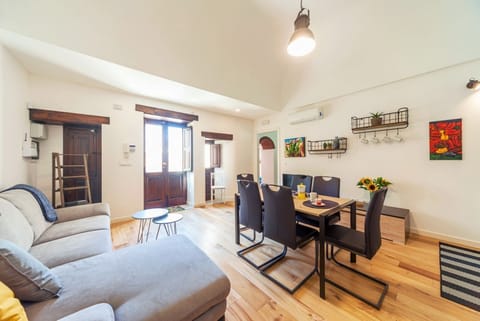 Apartment, 1 Bedroom | Living area | Flat-screen TV