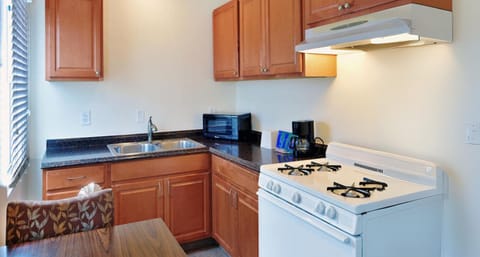 Studio Suite, 1 King Bed with Sofa bed, Kitchen | Private kitchen | Coffee/tea maker