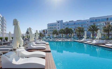 Seasonal outdoor pool, open 10:00 AM to 6:00 PM, free cabanas