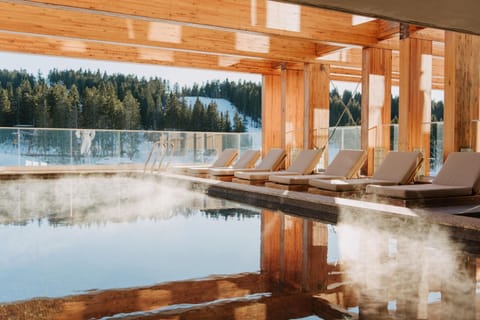 Indoor pool, outdoor pool, pool umbrellas, sun loungers