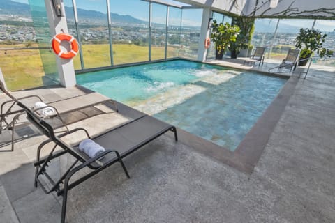 Outdoor pool, sun loungers