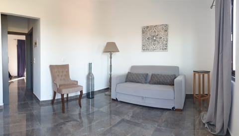 32-inch flat-screen TV with cable channels, TV