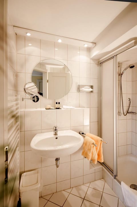 Shower, free toiletries, hair dryer, slippers