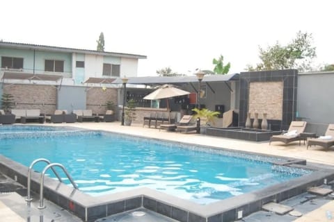 Outdoor pool, pool umbrellas, sun loungers