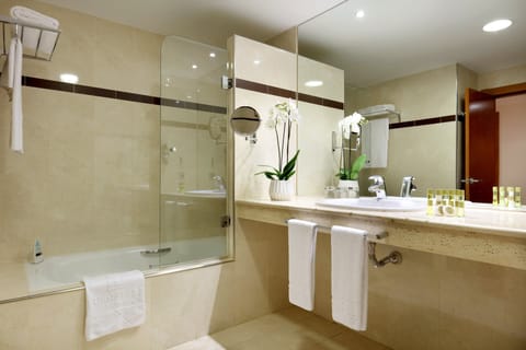 Suite, Jetted Tub | Bathroom | Eco-friendly toiletries, hair dryer, towels, soap