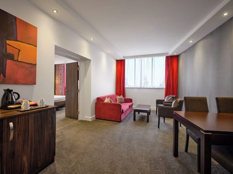 Suite, 1 Bedroom | In-room safe, desk, blackout drapes, iron/ironing board