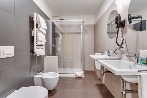 Shower, rainfall showerhead, hair dryer, towels