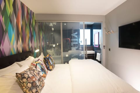 Desk, laptop workspace, blackout drapes, iron/ironing board