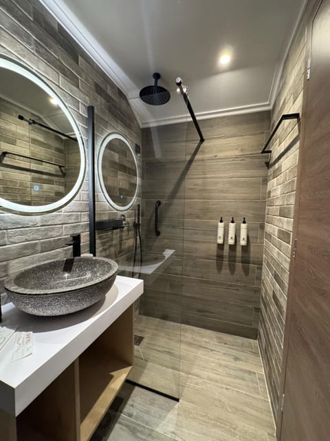 Single Room, Patio | Bathroom | Shower, free toiletries, hair dryer, slippers