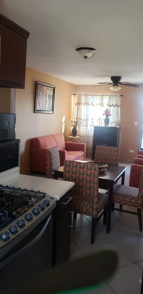 Basic Apartment | Living area | Flat-screen TV