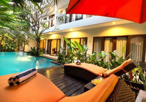 Outdoor pool, pool umbrellas, sun loungers