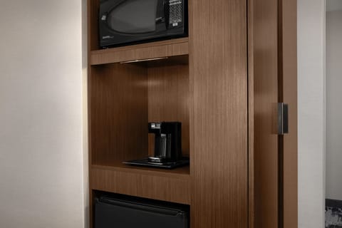 Pillowtop beds, desk, blackout drapes, iron/ironing board