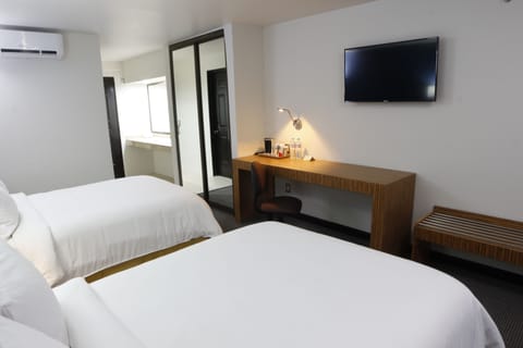 Hypo-allergenic bedding, in-room safe, desk, laptop workspace