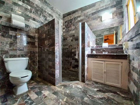 Master Suite with Private Terrace and Pool View | Bathroom | Shower, rainfall showerhead, free toiletries, towels