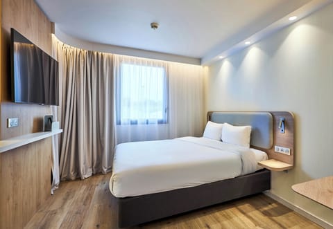 Premium bedding, Select Comfort beds, desk, laptop workspace