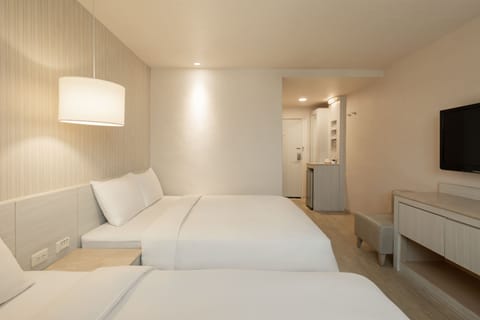 Quadruple Room, 2 Double Beds | Living area | 37-inch LED TV with cable channels, TV, DVD player