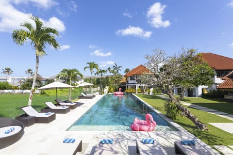 Outdoor pool, pool umbrellas, sun loungers