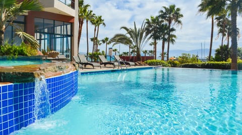 Indoor pool, 2 outdoor pools, open 10:00 AM to 9:00 PM, pool umbrellas
