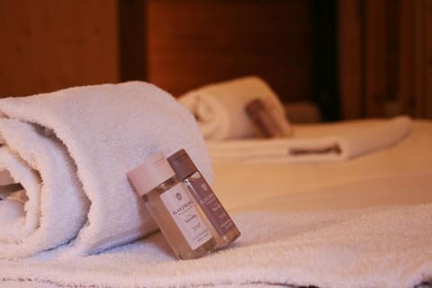 Shower, towels, soap, toilet paper