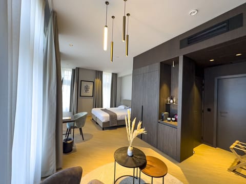 Twin Room, Beach View | Minibar, in-room safe, desk, blackout drapes