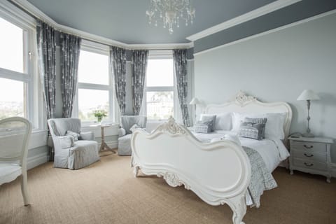  Deluxe French King | Premium bedding, individually decorated, individually furnished, desk