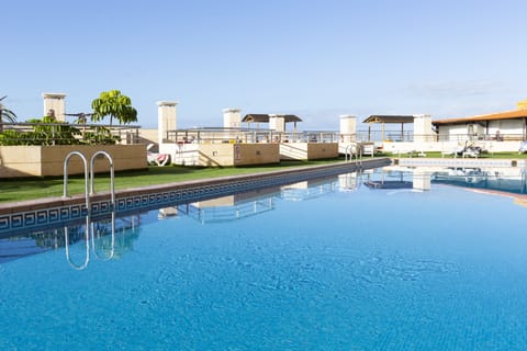 2 outdoor pools, pool umbrellas, sun loungers