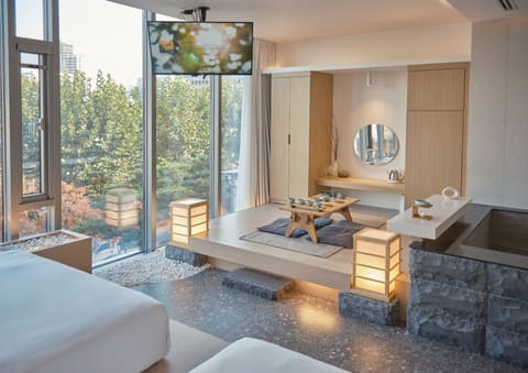Private City Spa | Blackout drapes, iron/ironing board, free WiFi, bed sheets