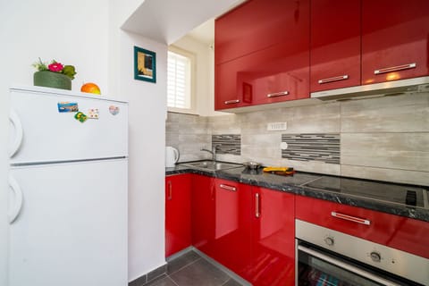 Apartment (Two Bedroom Apartment) | Private kitchen | Fridge, stovetop, dishwasher, electric kettle