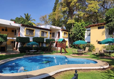 Outdoor pool, open 8:00 AM to 8:00 PM, sun loungers