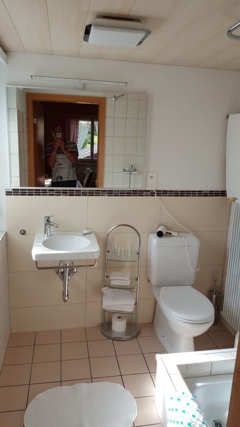 Family Quadruple Room, 1 Bedroom | Bathroom | Shower, rainfall showerhead, free toiletries, hair dryer